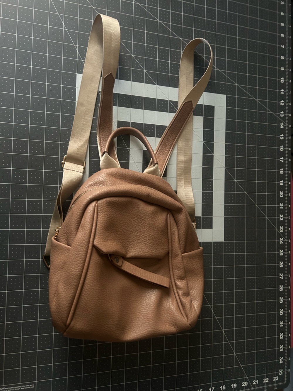 Casual Brown Pebbled Leather Backpack with Beige Webbing Straps